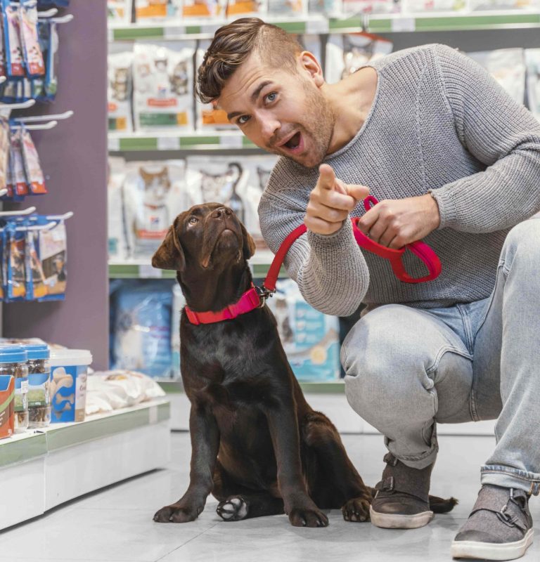 adorable-dog-with-owner-pet-shop-min-scaled-1